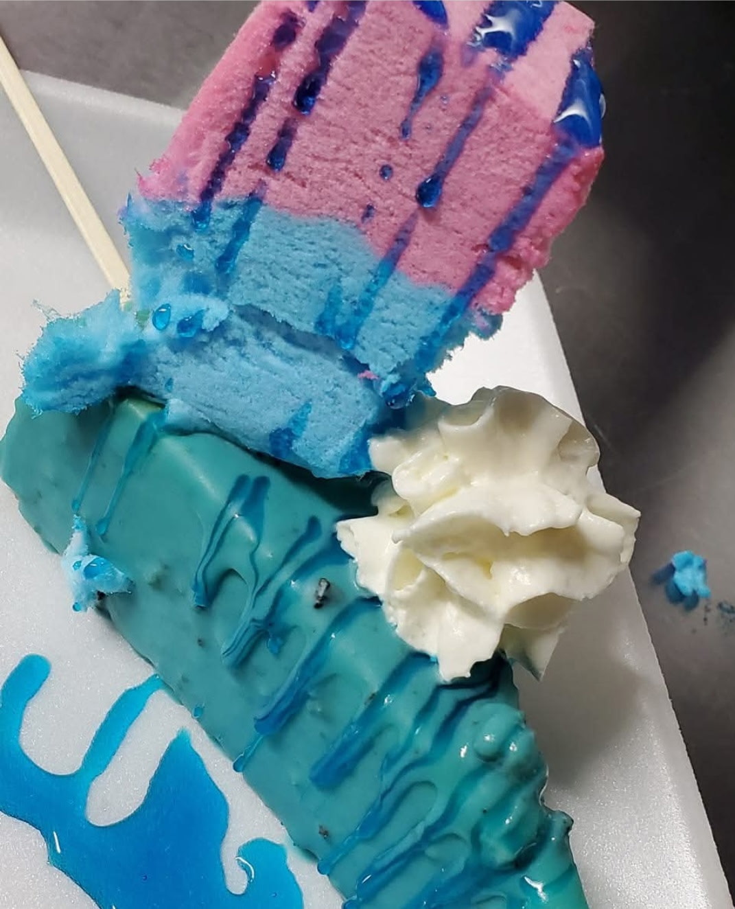 Cotton candy cheesecake on a stick